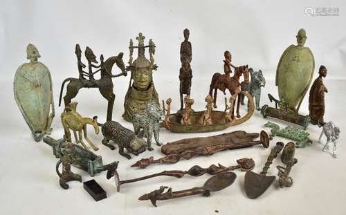 A group of tribal metalware including a Benin type bust, Dogon type figures, zoomorphic figures,