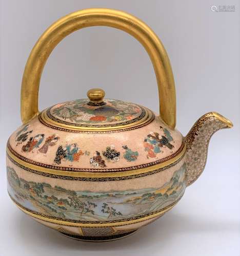 SEIKOZAN; a fine Japanese Meiji period Satsuma ewer of bronze form, the gilt handle above floral