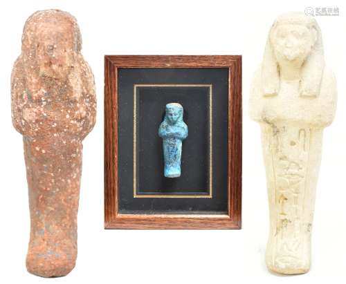 A turquoise glazed Egyptian Ushabti, length 10cm, framed and glazed, and two further stone