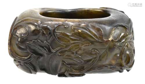 A rectangular Chinese hardstone ink pot with carved floral detail throughout, length 7cm.