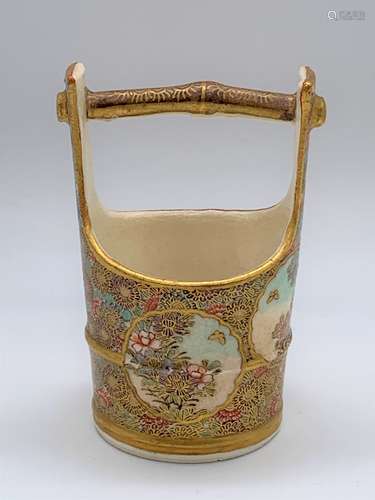 KINKOZAN; a Japanese Meiji period Satsuma pail decorated with panels of floral sprays on a