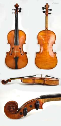 A full size violin with two-piece back baring handwritten label to interior 'Andreas Renisto Fecit