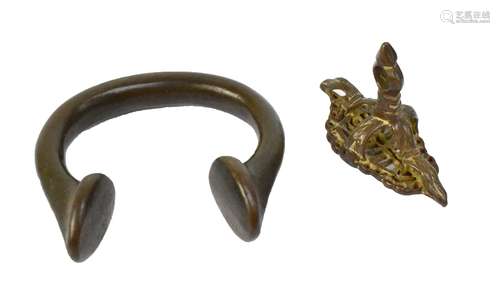 An 18th century bronze henna seal and West African trade ring (2).