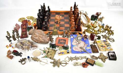 A quantity of Africa souvenir wares including a carved wooden chest set, various ornaments, tiles,