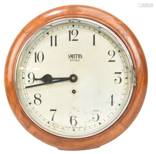 SMITHS ENFIELD; an oak cased wall clock, circular dial with Arabic numerals, diameter 39cm.
