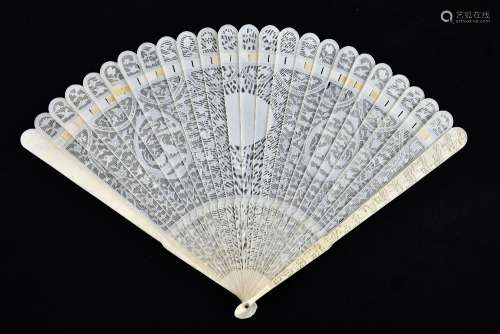 A late 19th century Chinese Export carved ivory brisé fan, the outer sticks featuring well carved