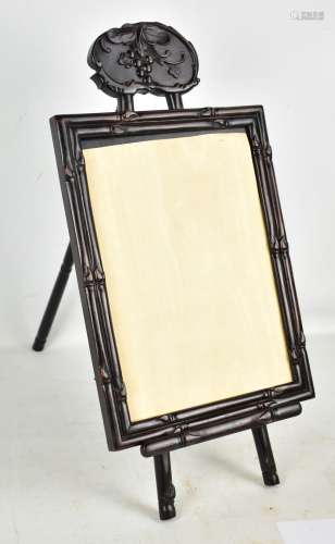 An early/mid-20th century Chinese carved hardwood rectangular photograph frame, 36 x 37cm, on