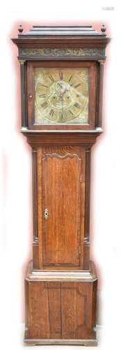 A George III oak cased eight day longcase clock, the brass face set with circular dial with Roman