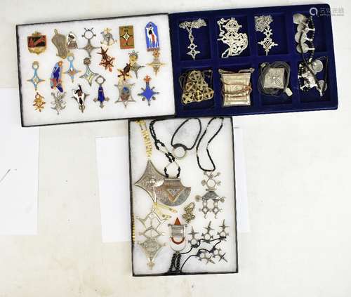 A quantity of African tribal jewellery including enamel pendants, rings, necklaces, etc.