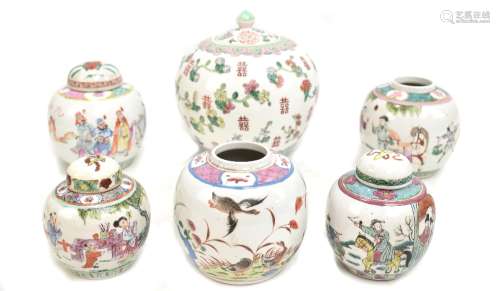 A 20th century Chinese lidded ovoid jar with enamelled floral decoration featuring stylised shou