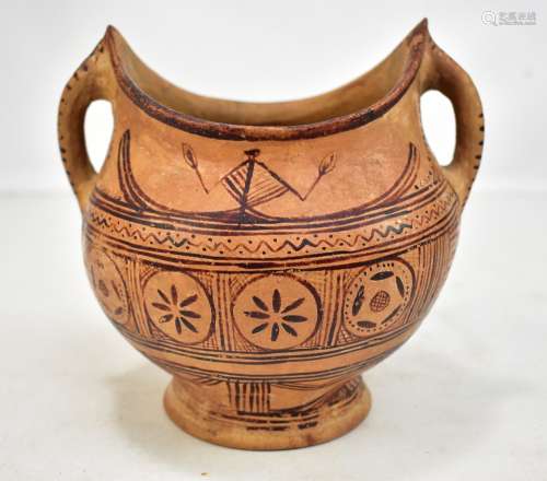 A circa 200BC Cypriot painted terracotta twin handled vessel on spreading circular foot, height