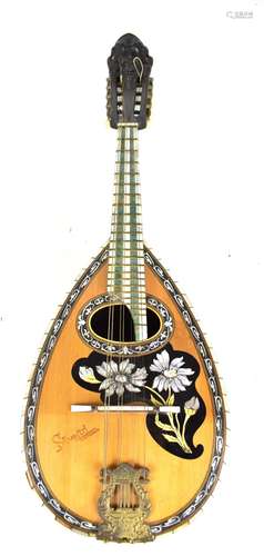 SILVESTRI CATANIA; a fine late 19th century eight string bowl back mandolin with figural carved