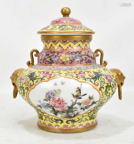 A 20th century Chinese lidded porcelain vase/vessel with twin gilt mask and loop handles featuring