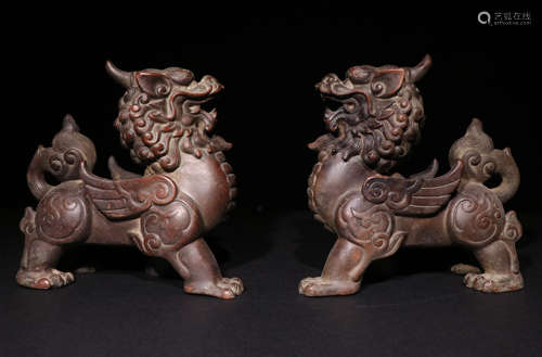 A pair of Qing Dynasty Bronze paper weight