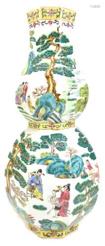 A modern Oriental double gourd vase, decorated with figures and landscape scenes, unmarked, height