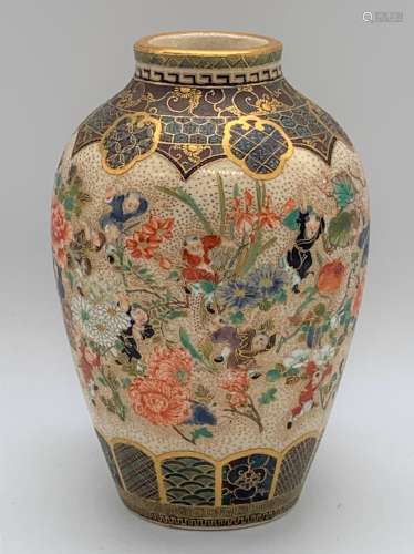A Japanese Meiji period Satsuma ovoid vase decorated with children amongst floral sprays, with