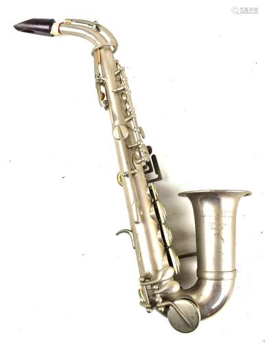 An early 20th century sopranino saxophone, marked 'Universel Savana Paris 88', length 46cm.