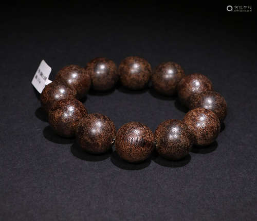 A Qing Dynasty Agarwood Hand String