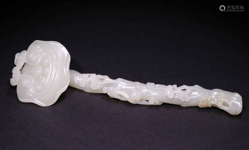 A Qing dynasty Carved Hetian Jade Ornament, Ruyi