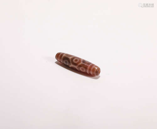 An ancient eight eyes tortoise shell patten Dzi bead