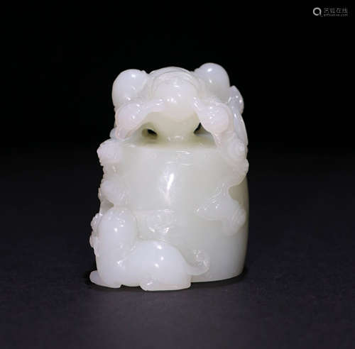 A Qing dynasty Carved Hetian Jade Ornament