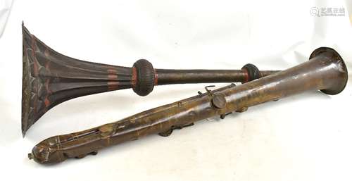 A large brass instrument presumed to be a Ophicleide, length 114cm, and a large Indian brass horn,