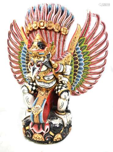 A South Indian or Sri Lankan (Ceylonese) winged spirit or demon figure, polychrome painted wood with