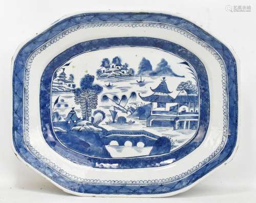 An early 19th century Chinese blue and white export octagonal meat plate, centrally decorated with a