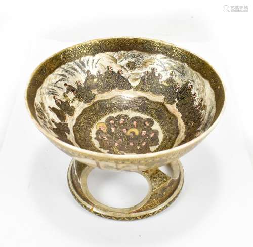 A Japanese Satsuma pedestal bowl on stand, painted with seated figures and faces to the inside,