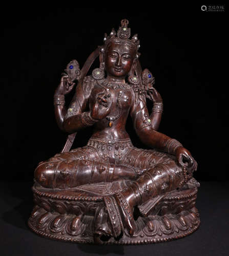 A Qing Dynasty Carved Agarwood Shadakshari Lokeshvara Statue