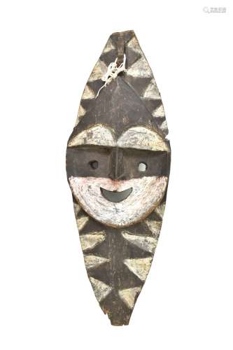 A Washkuk Yina mask, Papua New Guinea, with traces of painted decoration, length 71cm.Additional