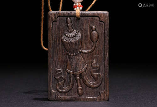 A Qing Dynasty Carved Agarwood Pendant