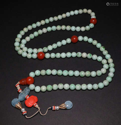 A Qing Dynasty jadeite 108 Buddha Beads String