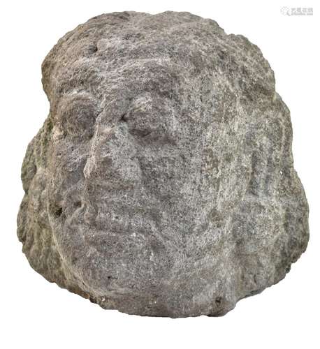 A large South East Asian carved rock fragmentary bust, width 37cm, height 3cm.Additional