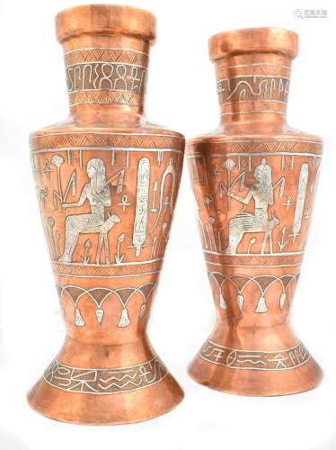 A pair of early 20th century Cairo Ware copper vases with white metal inlay featuring Ancient