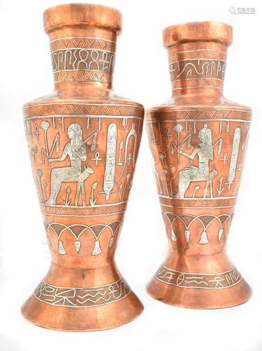 A pair of early 20th century Cairo Ware copper vases with white metal inlay featuring Ancient