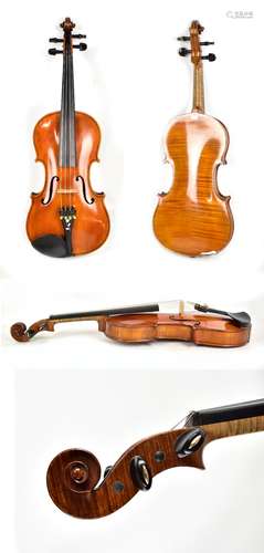 A full size German violin, Stradivarius copy with two-piece back, length 35.8cm and typical label,