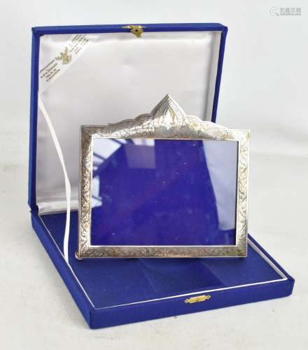 THAINAKON; a sterling silver and niello enamel photograph frame featuring Buddha and foliate