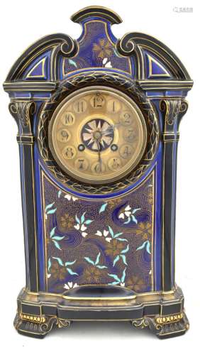 GIEN; a late 19th century ceramic mantel clock decorated with gilt floral panels and scrolls with