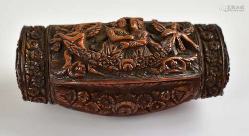 A 19th century carved coquilla nut snuff box, the hinged lid featuring male and female figures