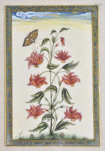 19TH CENTURY MUGHAL SCHOOL; four watercolour on ivory floral studies, all within coloured borders