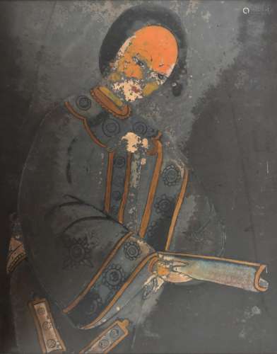 A late 19th/early 20th century Chinese reverse painting on glass depicting a female figure holding a