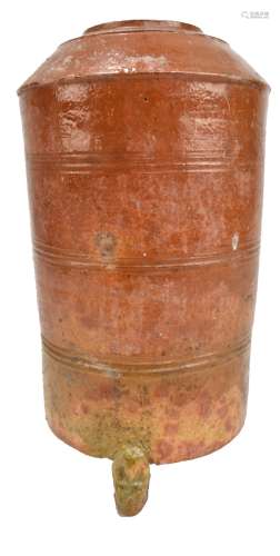 A Chinese Tang dynasty terracotta glazed earthenware urn/jar with incised bands to body on three
