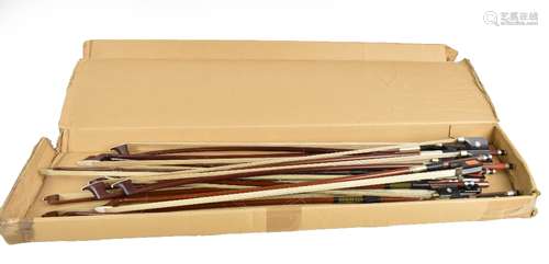 A collection of fourteen assorted bows, mainly cello bows.