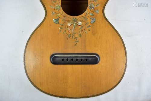 An early 20th century six string acoustic guitar with inlaid, painted and mother of pearl decoration