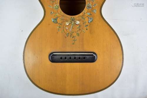 An early 20th century six string acoustic guitar with inlaid, painted and mother of pearl decoration