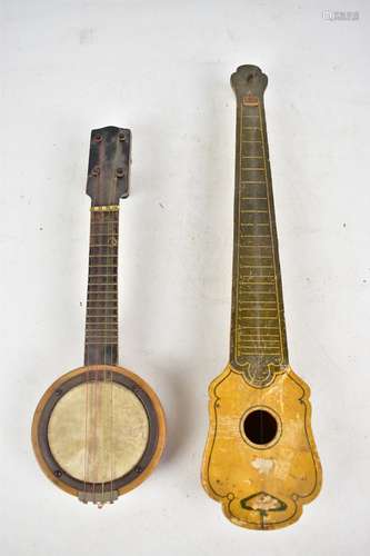 An early 20th century La Pacific type banjo ukulele, length 41cm, together with a novelty single