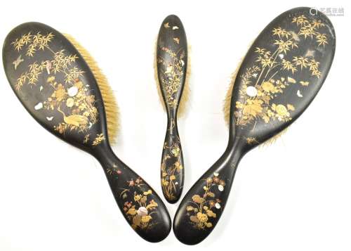 A Japanese Meiji period Shibayama trio of brushes with detailed gilt paint work to each piece,
