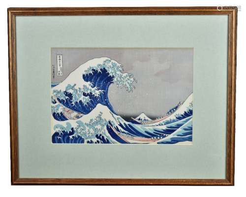 AFTER HOKUSAI; a Japanese woodblock print, 'The Wave', 24.5 x 35.5cm, framed and glazed.