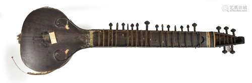 An Indian sitar with engraved bone mounts and single gourd back, overall length 270cm (af).